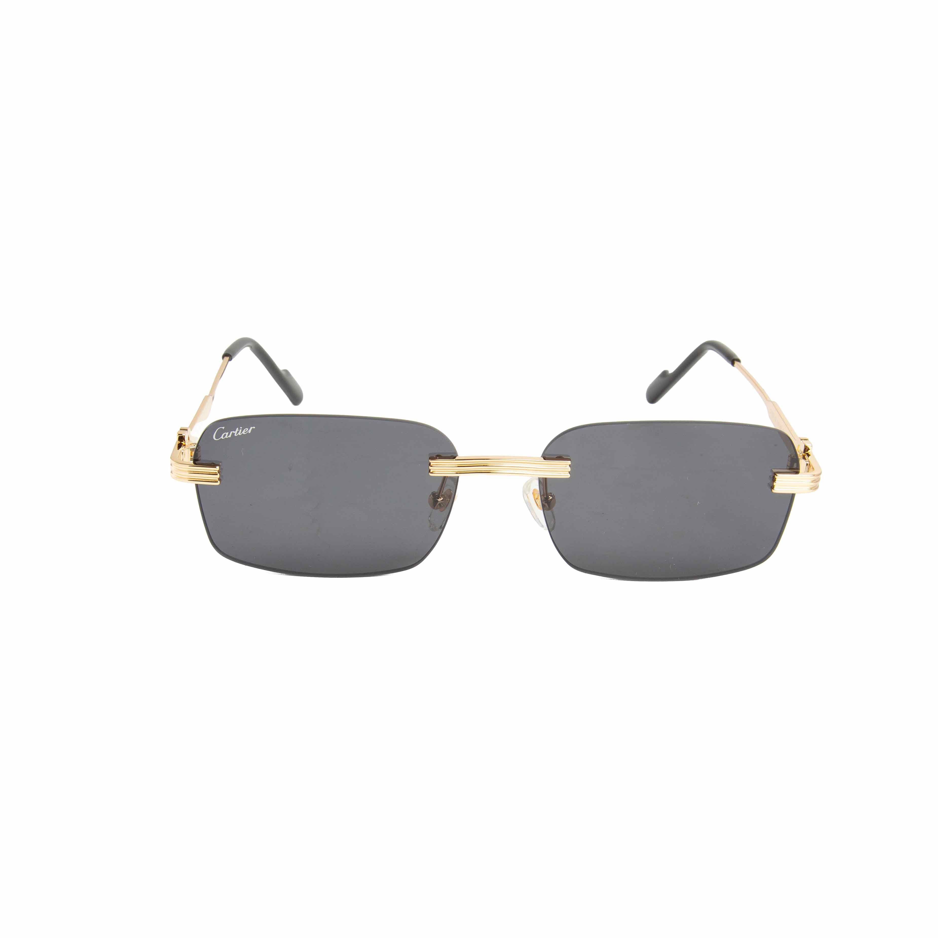 Cartier rimless grey lens rectangular sunglasses with gold-tone accents. Luxury eyewear for men and women.