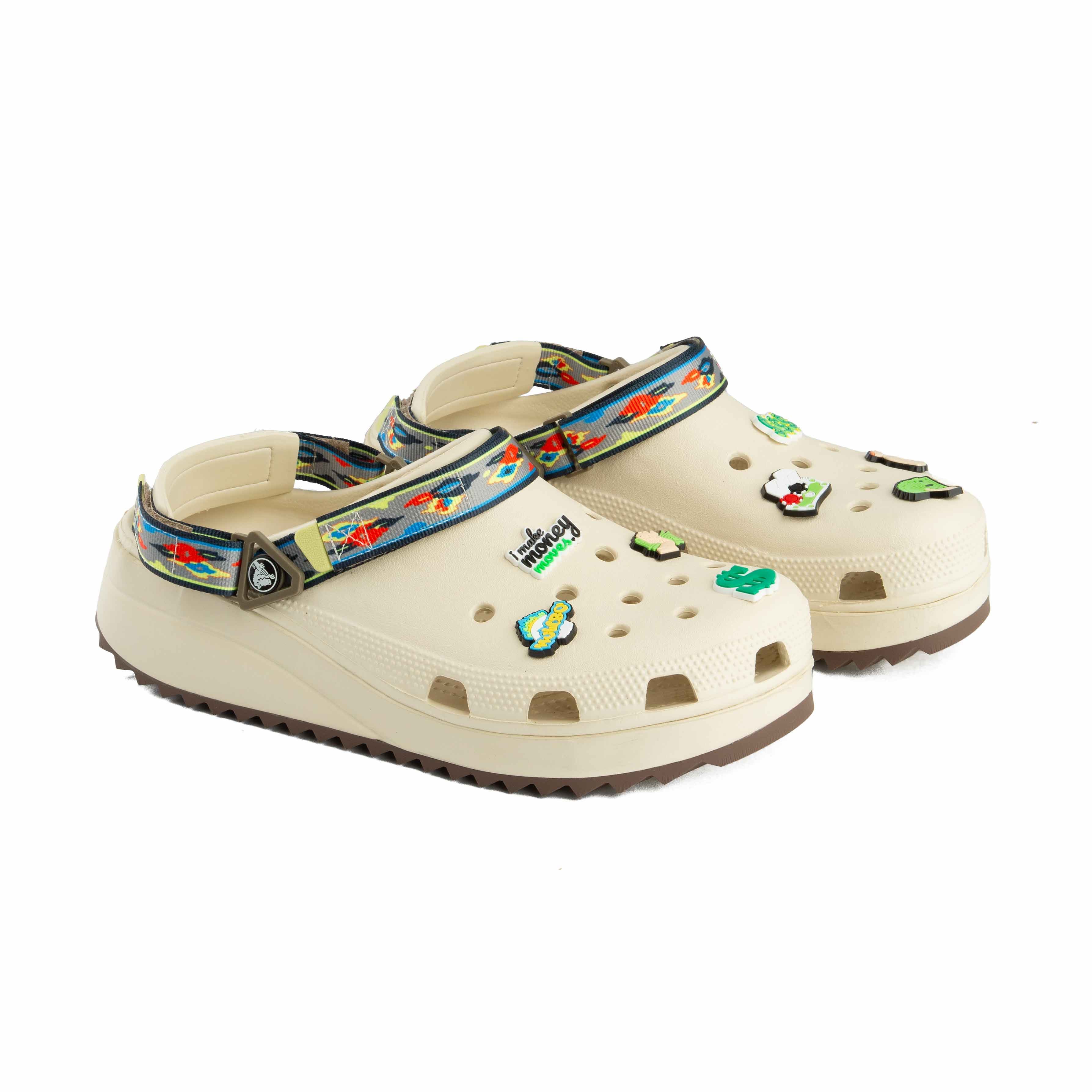 Elevate your look with the Crocs Classic Crush Platform Clogs in off-white. 