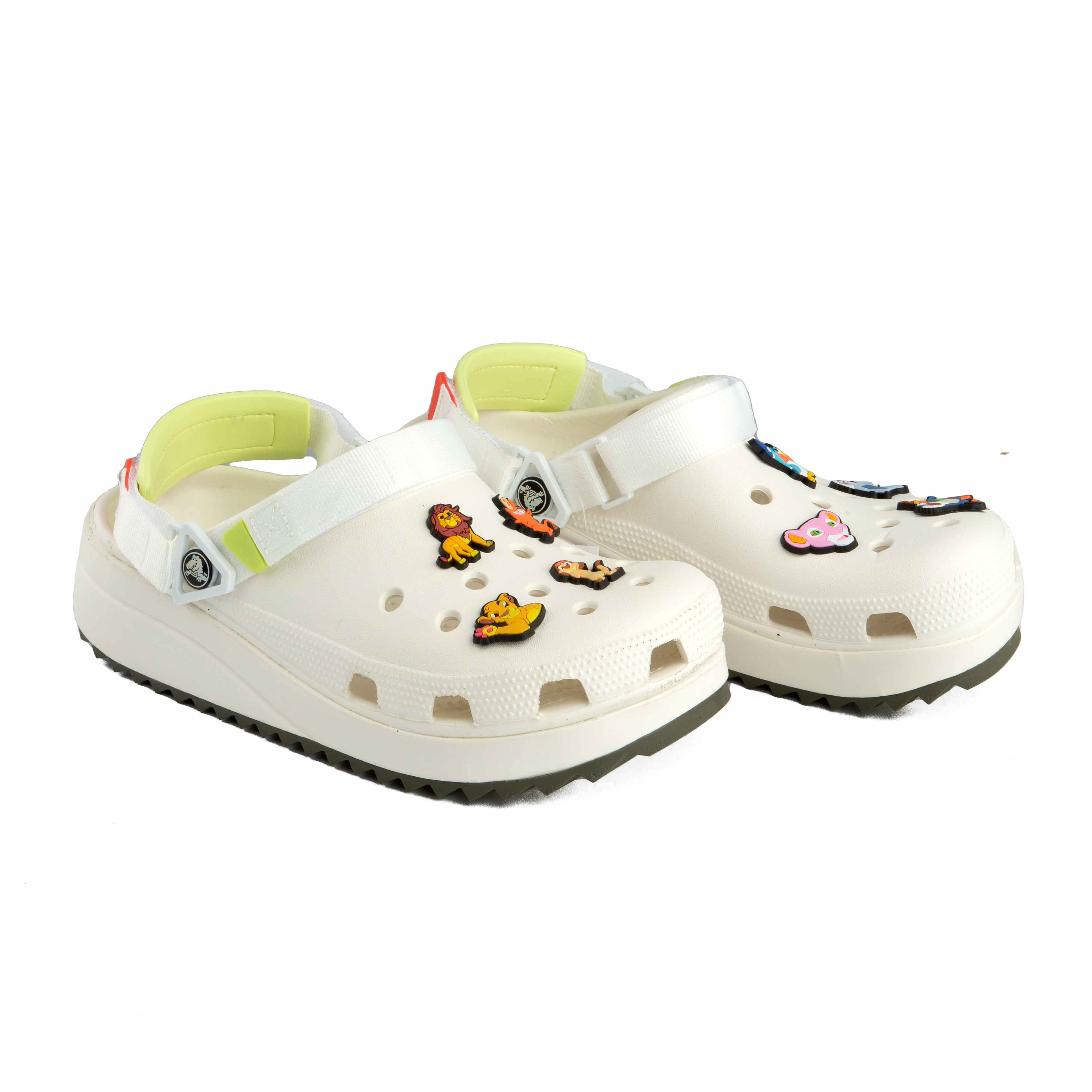 Elevate your look with the Crocs Classic Crush Platform Clogs in off-white. Featuring a chunky sole, vibrant strap accents, and customizable Jibbitz for fun. Perfect comfort.