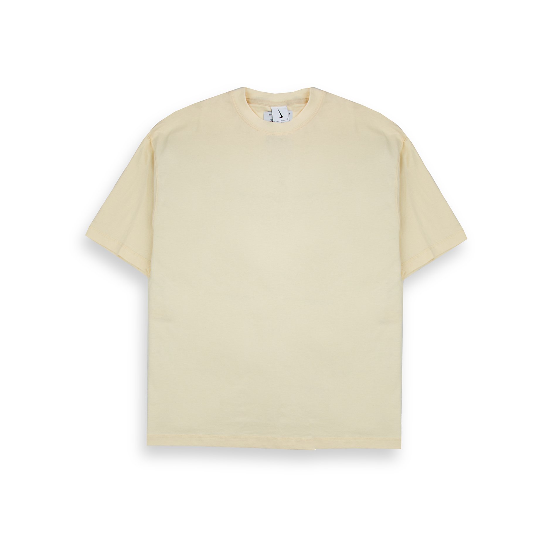 A plain cream-colored Nike t-shirt with a minimalist, clean design.