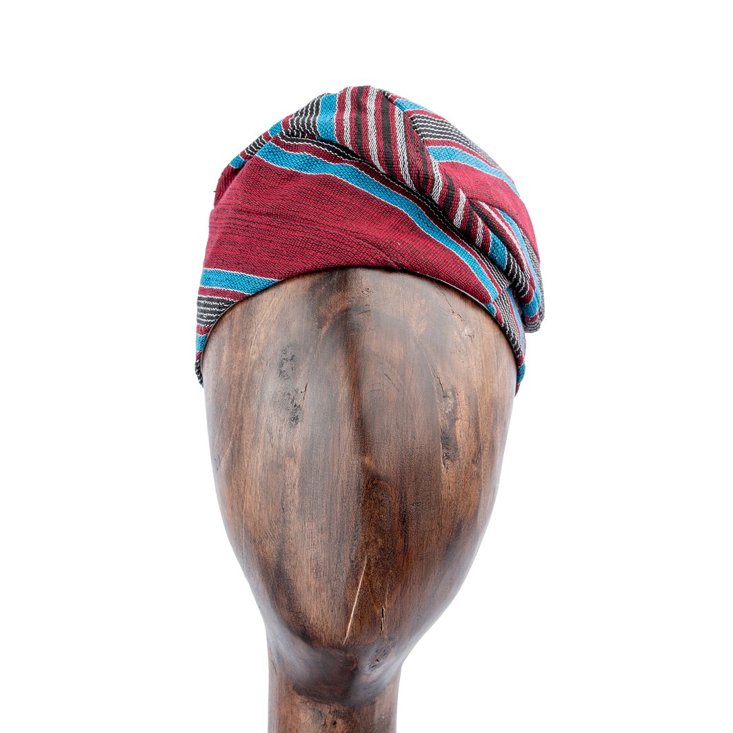Elegant handwoven burgundy and teal Aso-Oke cap with black and white accents. A stylish unisex accessory for traditional events and formal occasions