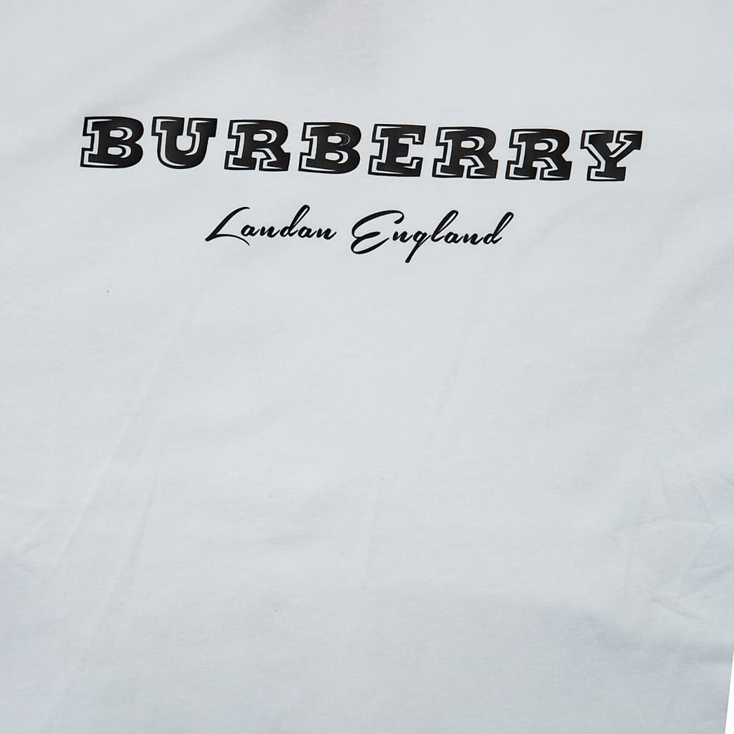 This is a classic white, short-sleeved, crew-neck t-shirt from the luxury fashion house Burberry.