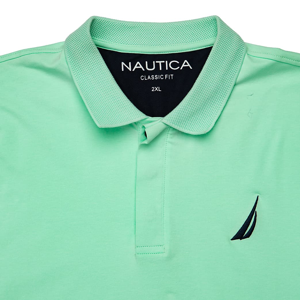 Mint Green Nautica short sleeve polo shirt with black embroidered J-Class sail logo on chest, men's breathable piqué cotton.