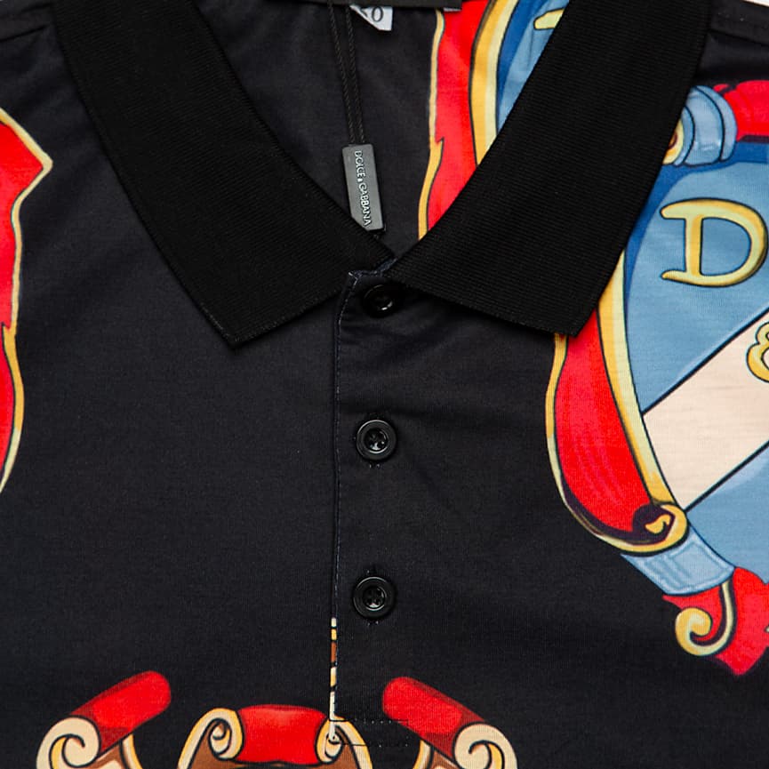 This is a high-fashion, short-sleeve polo shirt from Dolce & Gabbana.