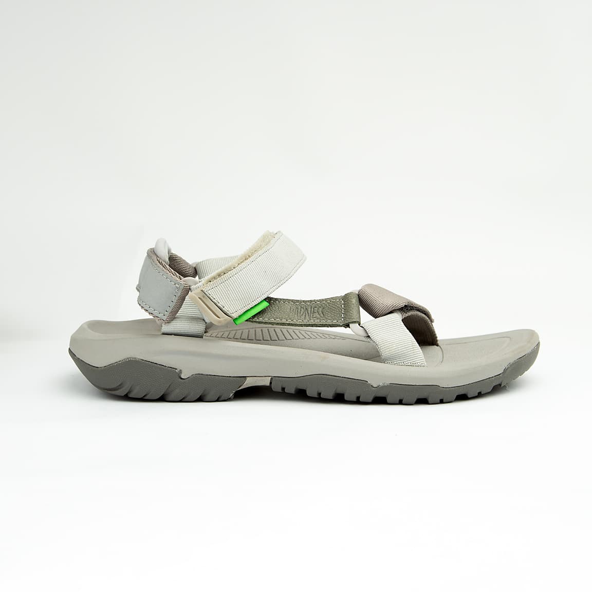 Grey unisex adjustable outdoor sandals with cushioned footbed and durable rubber sole.