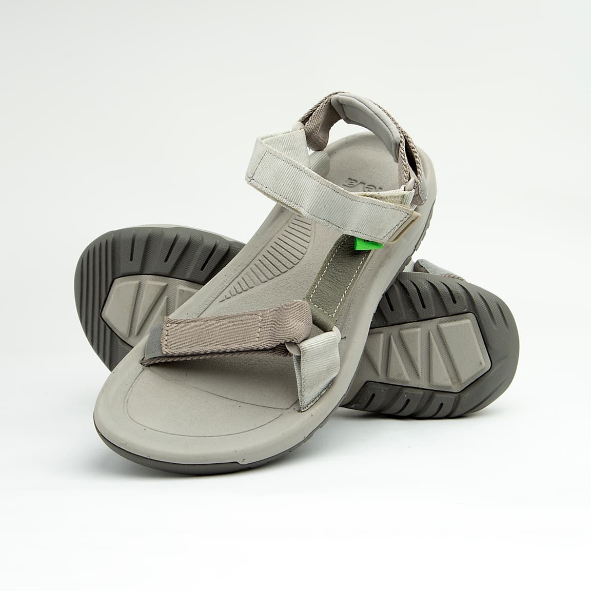 Grey unisex adjustable outdoor sandals with cushioned footbed and durable rubber sole.