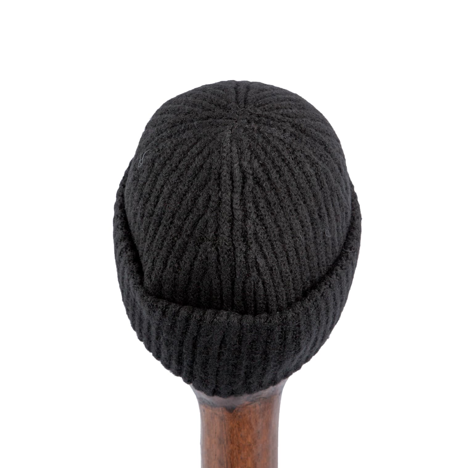Black wool beanie with ribbed knit texture and tricolor logo patch for a stylish and cozy winter accessory.