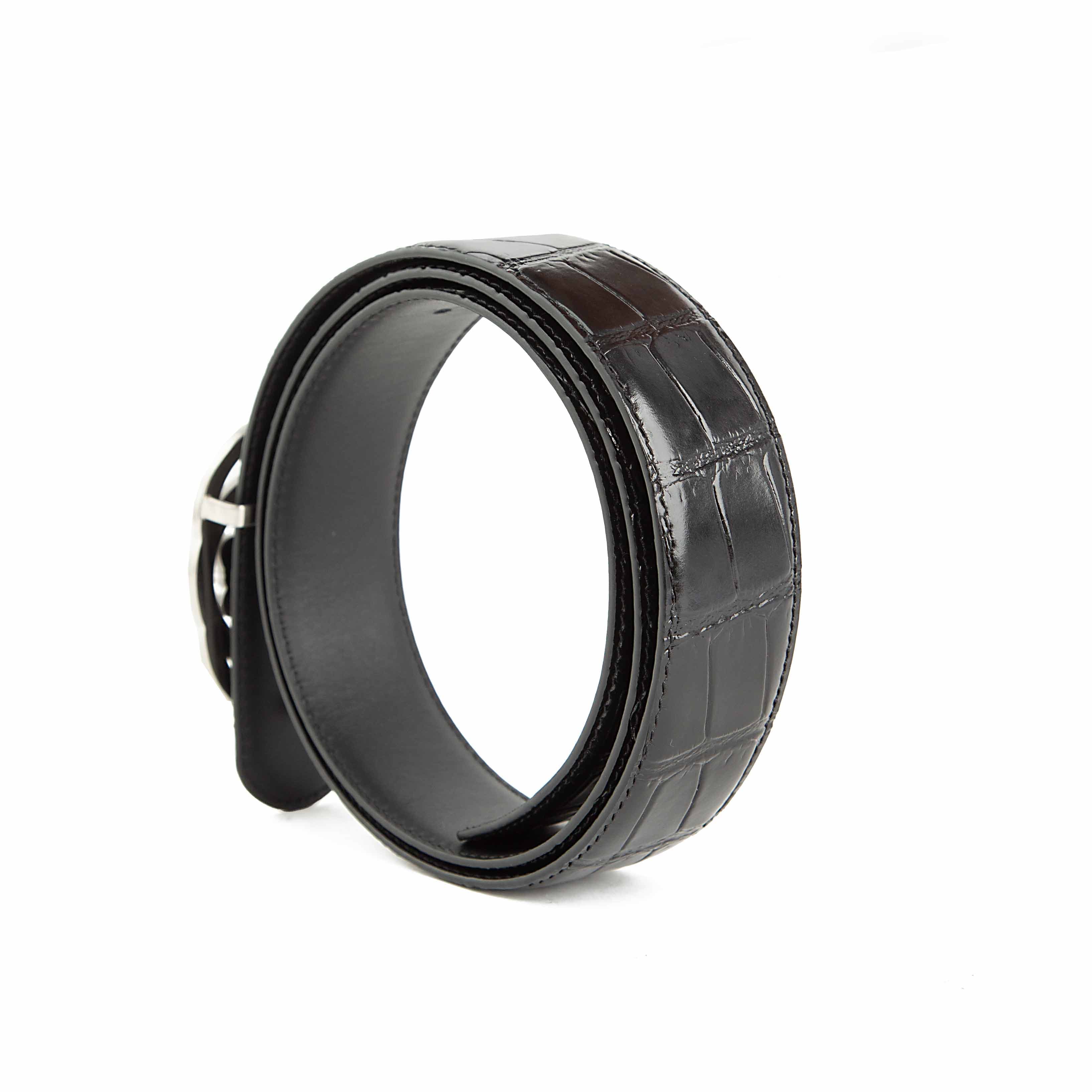 This is a high-fashion, statement Black Leather Belt defined by its bold, colorful design.