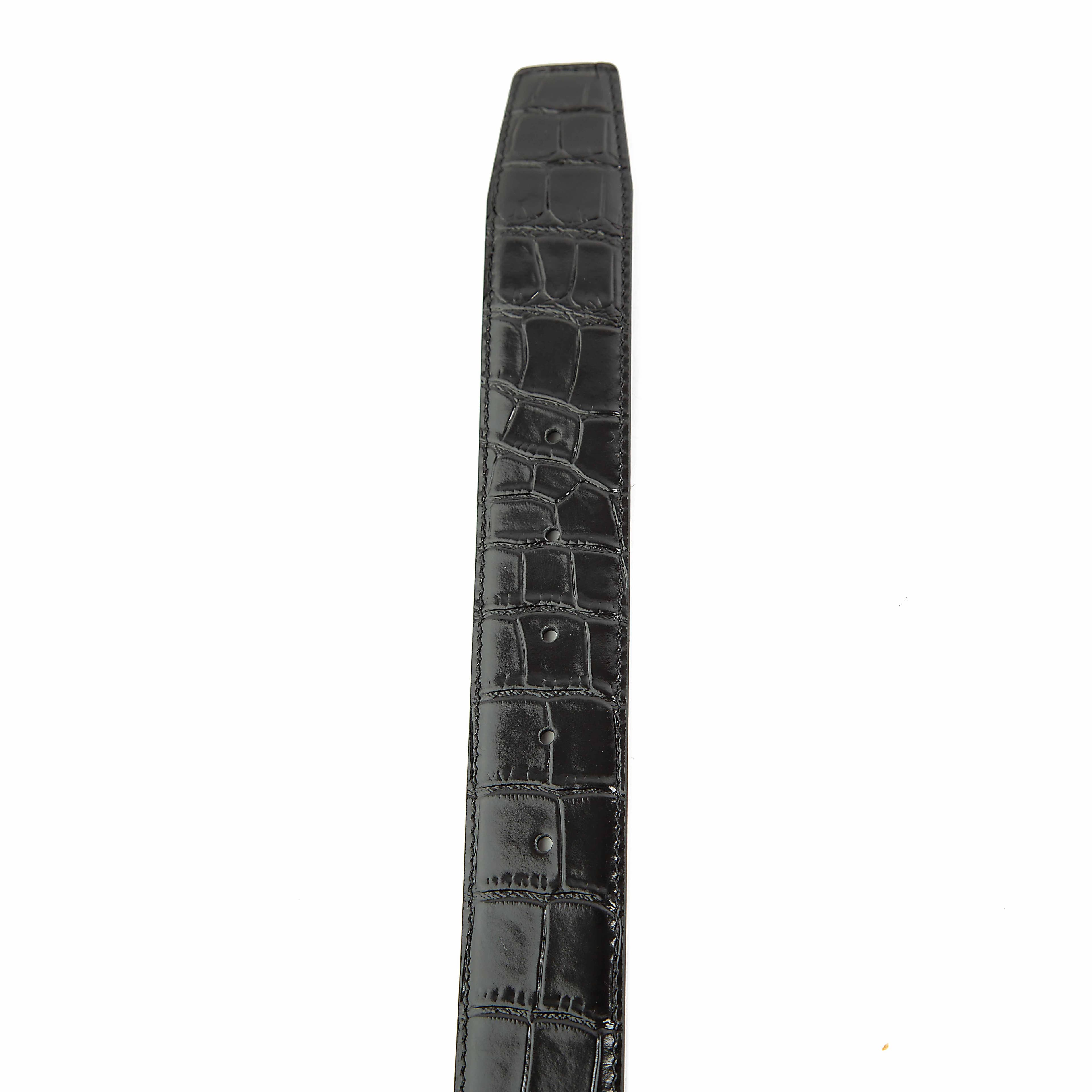 This is a high-fashion, statement Black Leather Belt defined by its bold, colorful design.